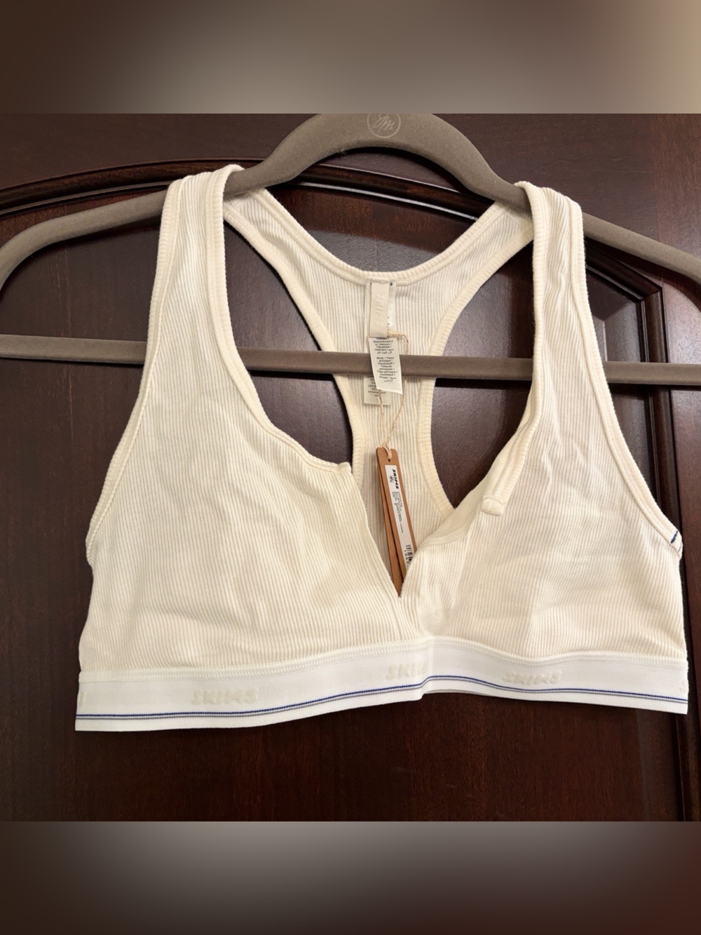 SKIMS Ribbed Racerback Bralette in Off-White with Blue Trim